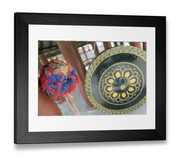 Framed Print : Large decorated gong with a mallet in a Buddhist monastery The Shwezigon Pagoda or Shwezigon Paya