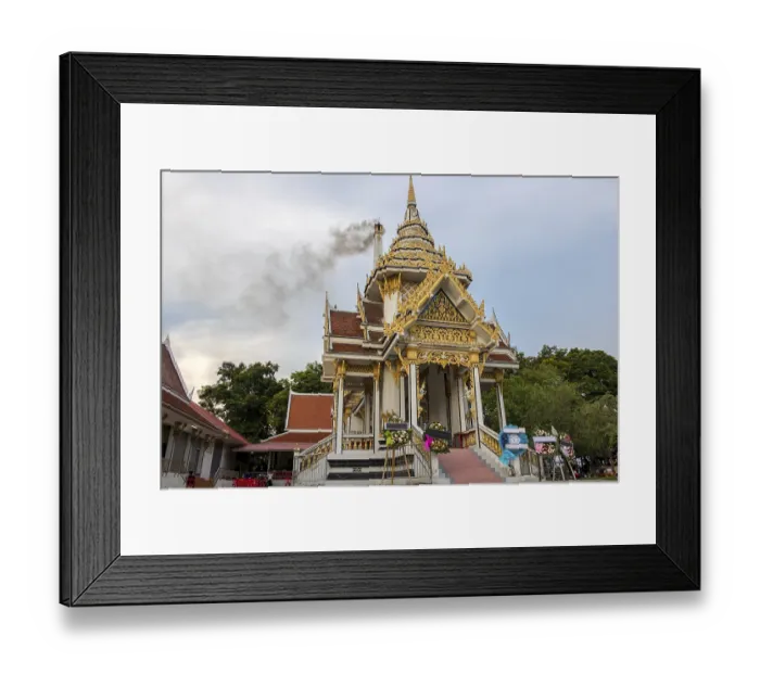 Framed Print : Crematorium in Buddhist monastery with smoke rising from chimney after funeral ceremony