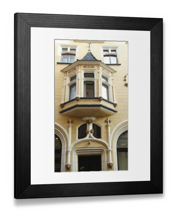 Framed Print : Fragment of the facade of a historic Art Nouveau building in the city center