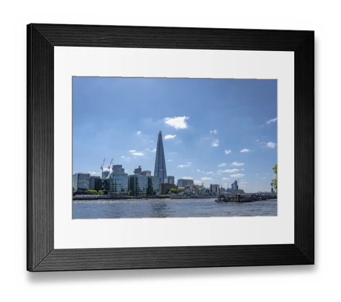 Framed Print : London, United Kingdom - 17 May 2025: Urban cityscape of London featuring The Shard building and river Thames water Framed Print : London, United Kingdom - 17 May 2025: Urban cityscape of London featuring The Shard building and river Thames water