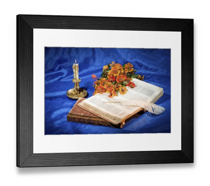 Framed Print : Candle, books and goose feather on fabric background Framed Print : Candle, books and goose feather on fabric background