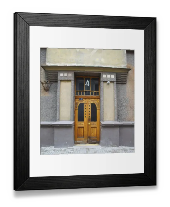 Framed Print : Fragment of the facade with the door of a residential building in the style of national romanticism on one of