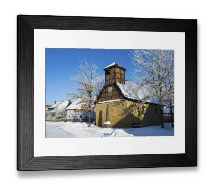 Framed Print : Snowy frame house in a village surrounded by snow-covered trees and clear sky Framed Print : Snowy frame house in a village surrounded by snow-covered trees and clear sky