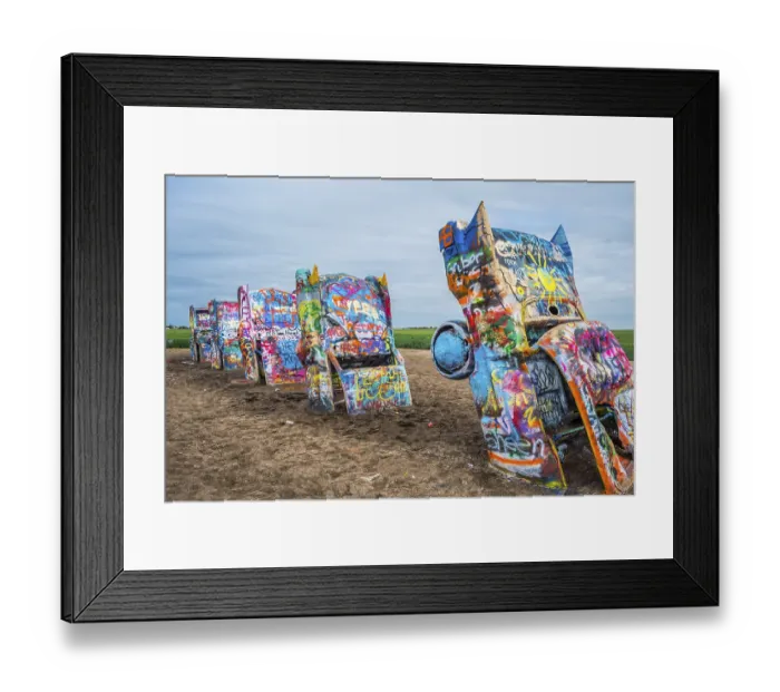 Framed Print : Amarillo, TX, USA - April 29, 2019: A brightly painted Cadillacs in Cadillac Ranch