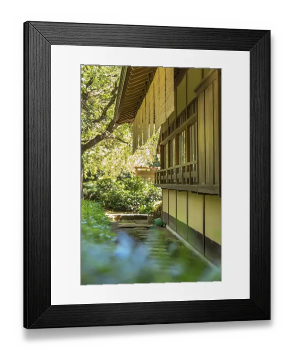 Framed Print : Shaded tea house lined with a circular stone path with reed canopies at its windows in Shinjuku Gyoen Park in Tokyo Framed Print : Shaded tea house lined with a circular stone path with reed canopies at its windows in Shinjuku Gyoen Park in Tokyo