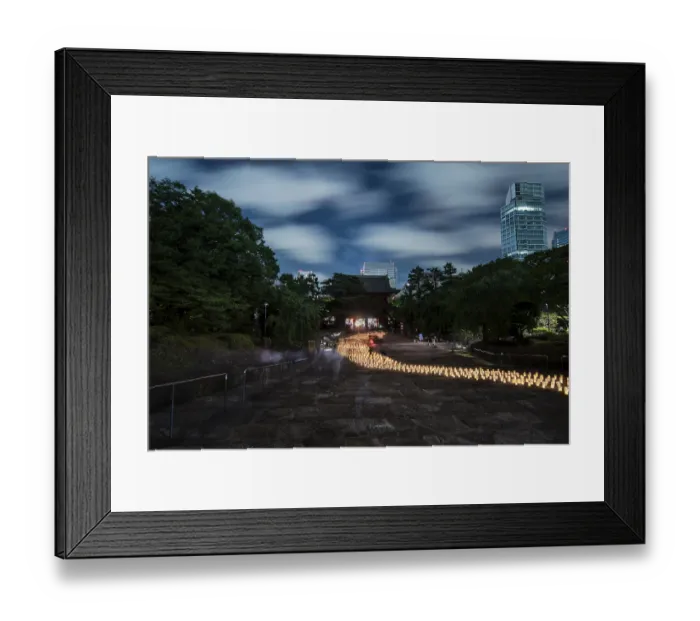 Framed Print : Japanese lanterns made of hand-made washi rice paper arranged in the shape of a milky way illuminating the stones of