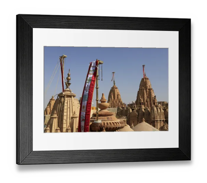 Framed Print : Flags and detail reliefs on rooftops of Jain temple in Jaisalmer Framed Print : Flags and detail reliefs on rooftops of Jain temple in Jaisalmer