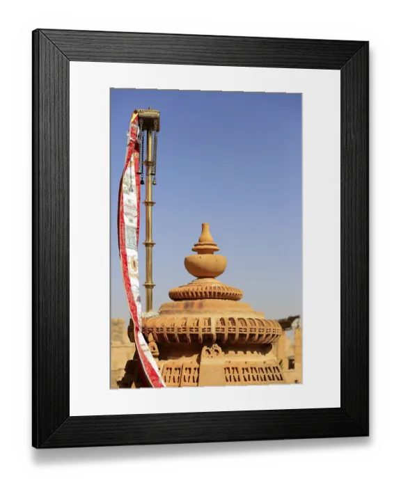 Framed Print : Flags and detail reliefs on rooftops of Jain temple in Jaisalmer