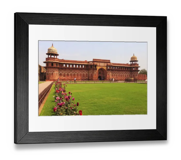 Framed Print : AGRA, INDIA - March 24, 2013 : Unidentified people who visits the castle walk in the Garden of the Palace
