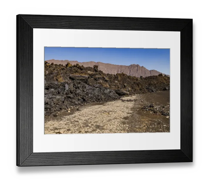 Framed Print : An eruption of the volcano Pico do Fogo in Cape Verde has made the road through the crater impassable Framed Print : An eruption of the volcano Pico do Fogo in Cape Verde has made the road through the crater impassable