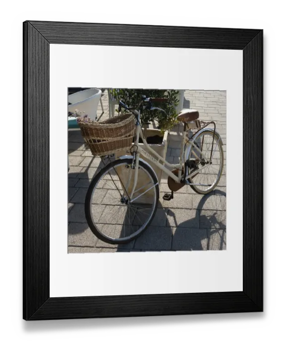 Framed Print : Vintage bicycle with basket parked on street Framed Print : Vintage bicycle with basket parked on street