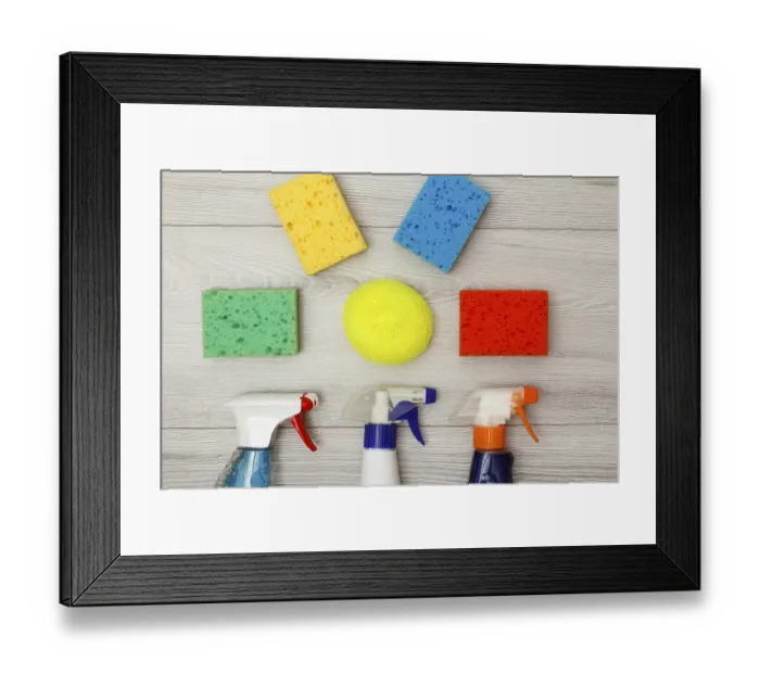 Framed Print : Water sprayers and color synthetic sponges for cleaning on gray wooden background Framed Print : Water sprayers and color synthetic sponges for cleaning on gray wooden background