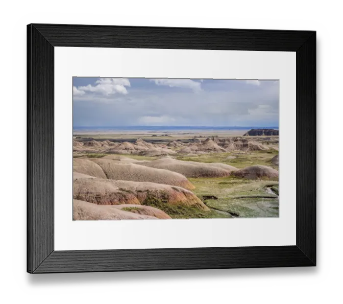 Framed Print : A layered rugged terrain rock formations of the preserve national park