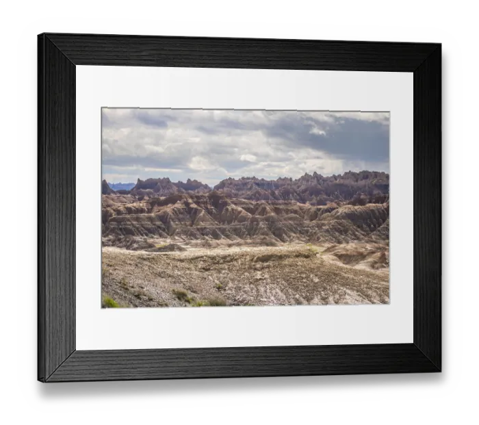 Framed Print : A layered rugged terrain rock formations of the preserve national park