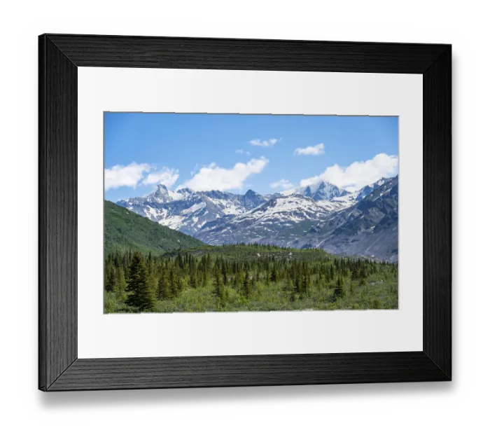 Framed Print : Mountain peak with snow and taiga
