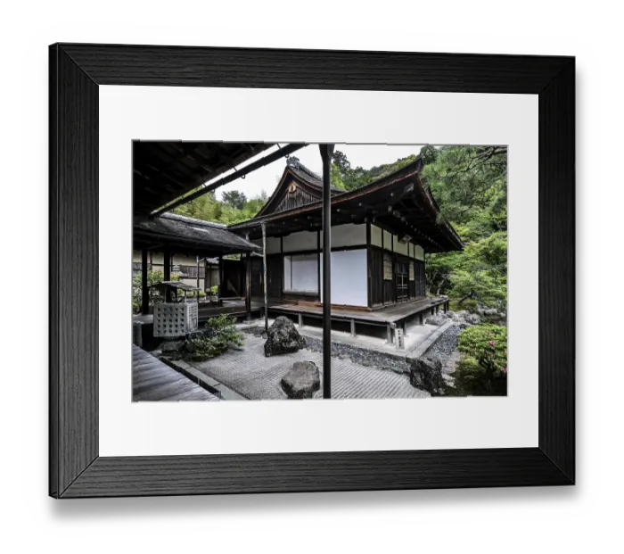 Framed Print : Zen garden with traditional pavilion surrounded by carefully arranged rocks and green vegetation Framed Print : Zen garden with traditional pavilion surrounded by carefully arranged rocks and green vegetation
