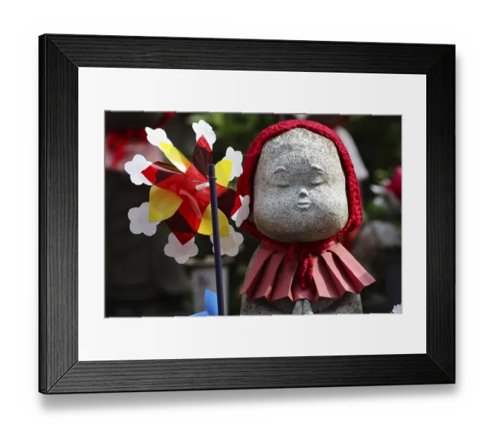 Framed Print : Jizo statue with red cloth and wind turbine at Zojo-ji shrine in Minato Framed Print : Jizo statue with red cloth and wind turbine at Zojo-ji shrine in Minato