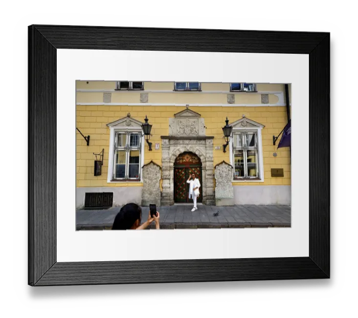 Framed Print : The magnificent facade of the Guild House in the Old Town attracts tourists with its architecture