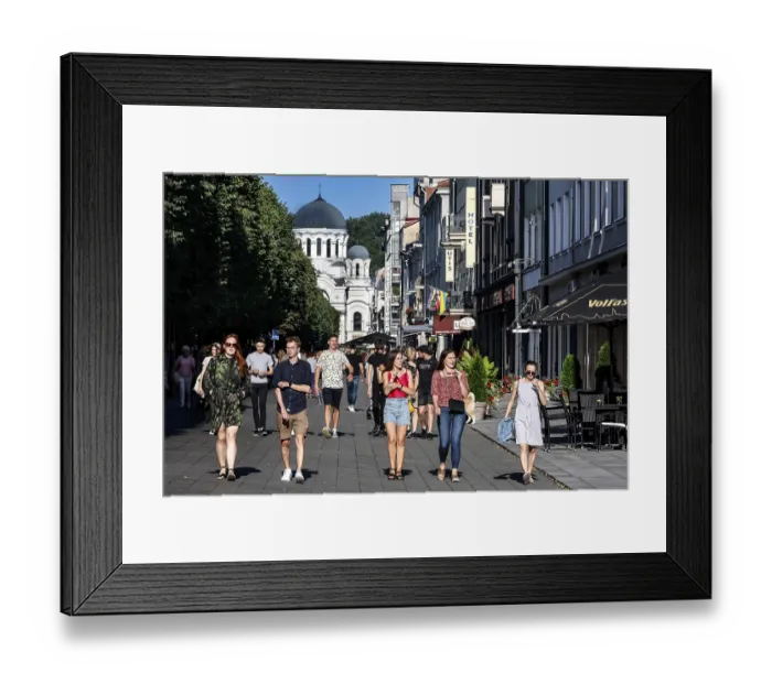Framed Print : Laisves aleja in Kaunas with passers-by and the Church of Archangel Michael in the background Framed Print : Laisves aleja in Kaunas with passers-by and the Church of Archangel Michael in the background