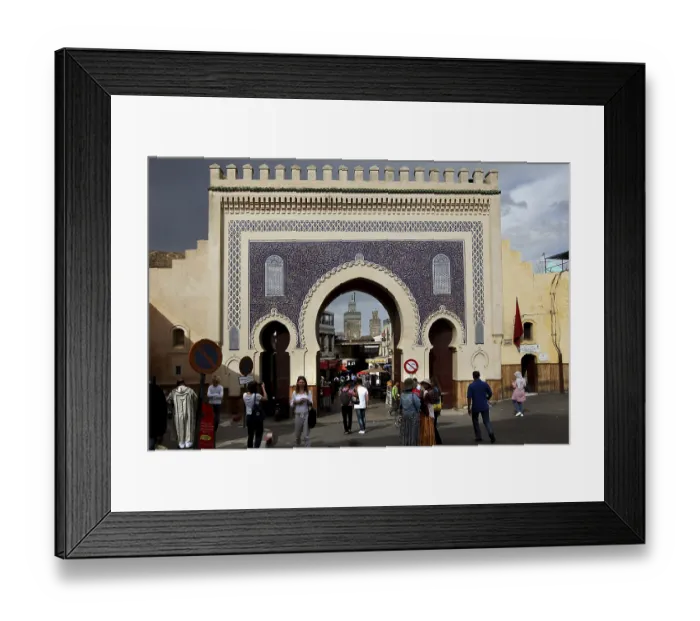 Framed Print : Bab Boujeloud in Fez with traditional mosaics and numerous passers-by Framed Print : Bab Boujeloud in Fez with traditional mosaics and numerous passers-by