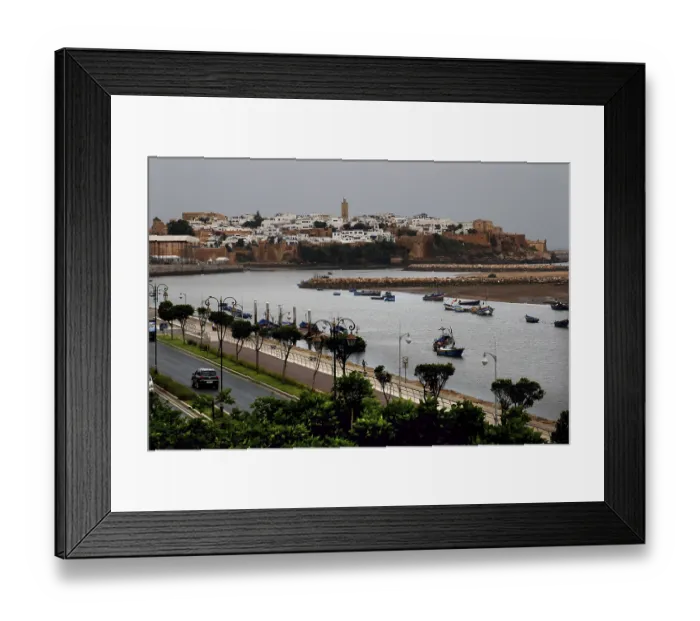 Framed Print : View across the river to the historic town of Sale with boats and city wall under cloudy sky Framed Print : View across the river to the historic town of Sale with boats and city wall under cloudy sky