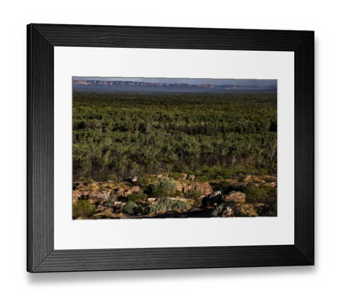 Framed Print : Dense green forests stretch across rocky landscape in Kakadu National Park Framed Print : Dense green forests stretch across rocky landscape in Kakadu National Park