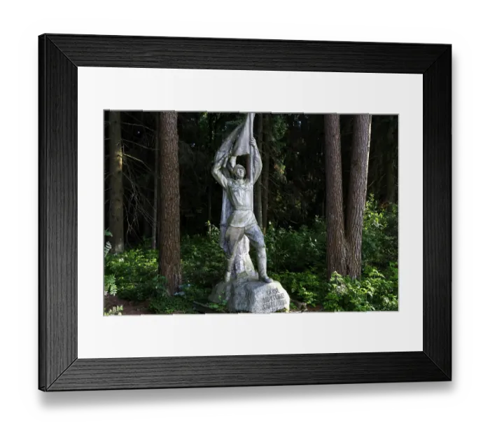 Framed Print : Socialist sculpture in the green forest of Grutas Park in Druskininkai