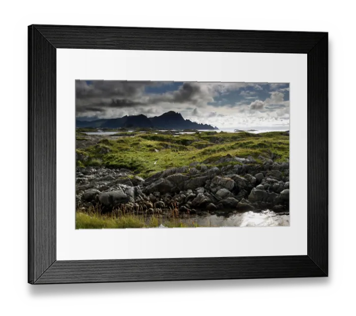 Framed Print : Rugged coastal area with green grassy areas and dramatic skies in Andenes Framed Print : Rugged coastal area with green grassy areas and dramatic skies in Andenes