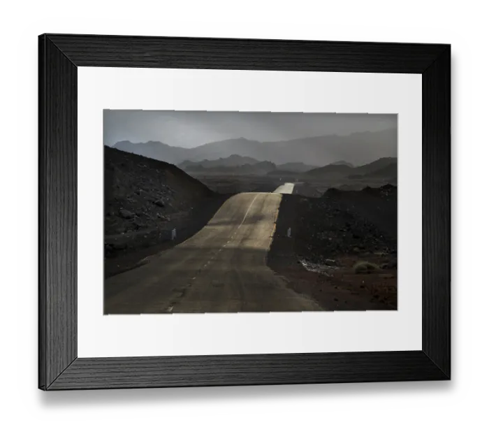 Framed Print : Deserted road in mountainous landscape with gloomy sky in Ahmedela