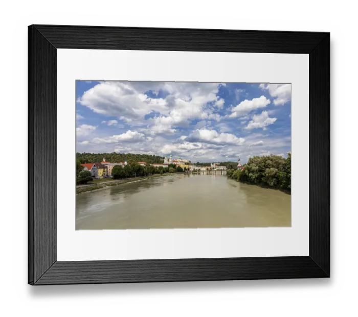Framed Print : Panoramic view of Passau Bavaria Germany with historic riverside buildings and fortress under cloudy sky