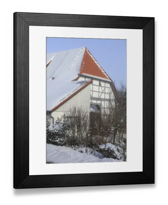 Framed Print : Timbered house, Ludersen mountain village snowed in winter after snowstorm Elli