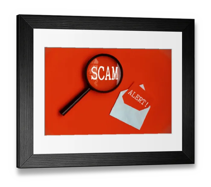 Framed Print : Scam Alert text on magnifying glass and notepad on red cover background