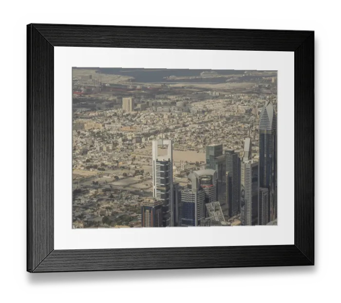 Framed Print : Aerial view of an urban landscape with modern skyscrapers and larger urban area Framed Print : Aerial view of an urban landscape with modern skyscrapers and larger urban area