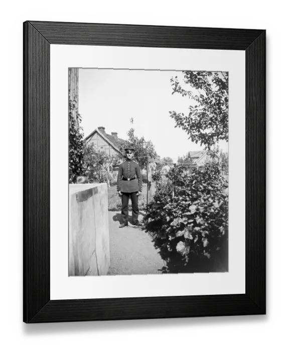 Framed Print : Soldier in uniform posing for the photo