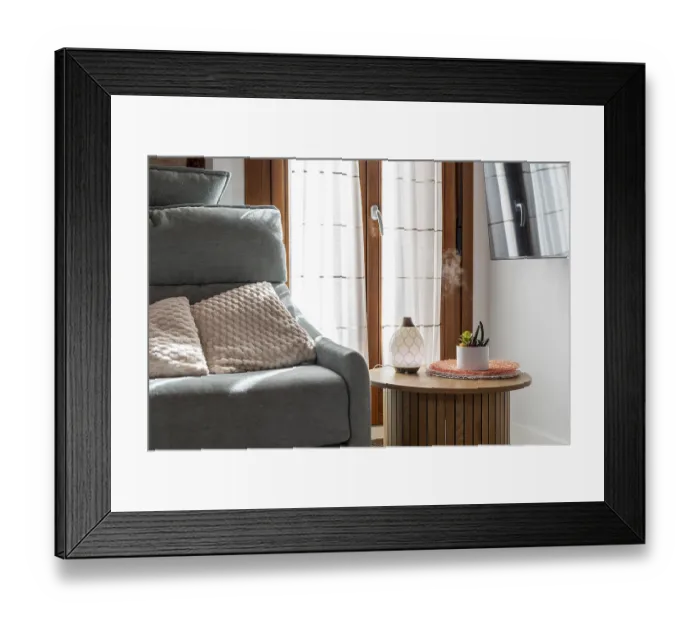 Framed Print : Essential oil diffuser releasing aromatic mist on a side table creating a relaxing atmosphere in a modern home
