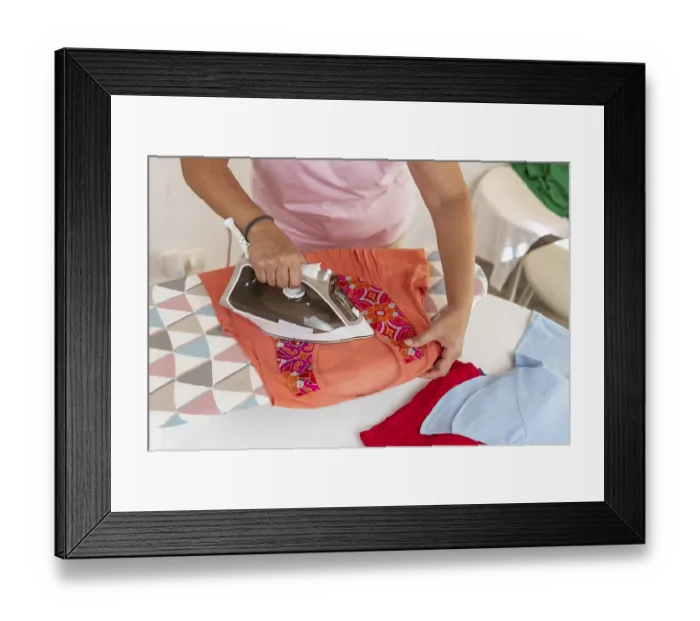Framed Print : Woman performing household chores