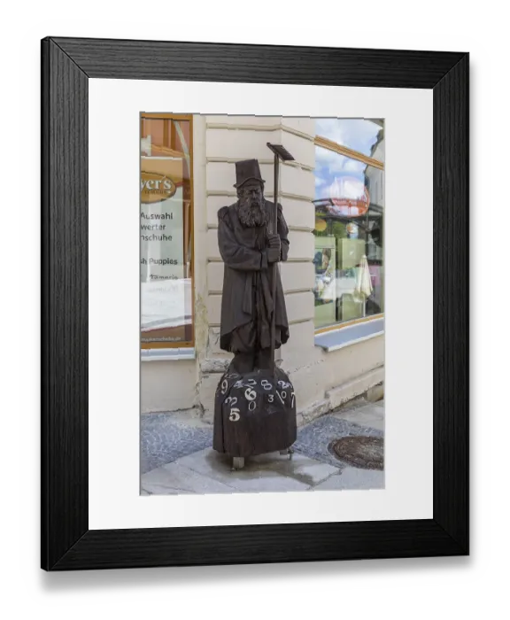 Framed Print : Wooden sculpture of Adam Ries as an arithmetic with numbers