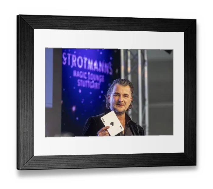 Framed Print : Magician Thorsten Strotmann during a presentation during the CMT trade fair