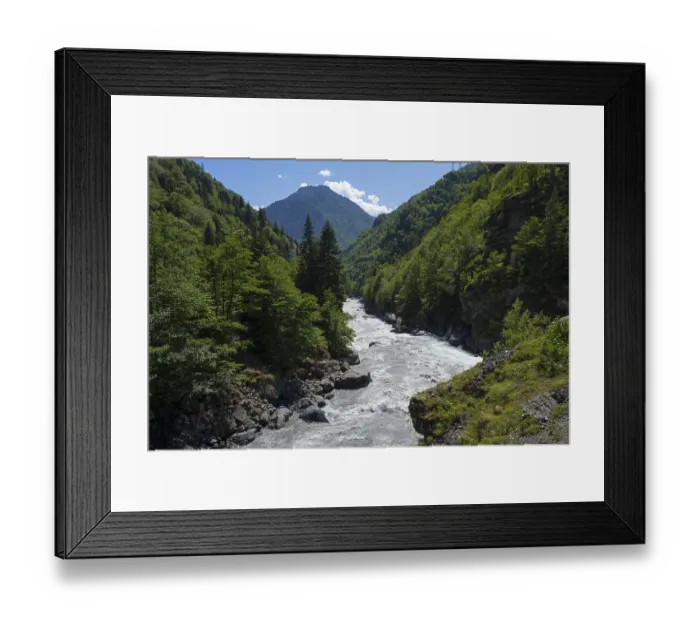 Framed Print : A picturesque river snakes through a wooded valley Framed Print : A picturesque river snakes through a wooded valley