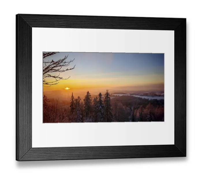 Framed Print : Winter landscape with sweeping views of snowy fields and a colorful sunset Framed Print : Winter landscape with sweeping views of snowy fields and a colorful sunset