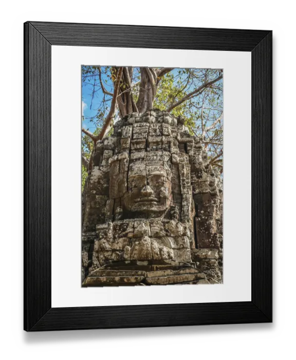 Framed Print : Huge stone face form in the Bayon Temple in the Angkor temple complex near Siem Reap