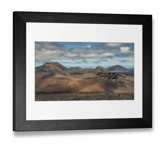 Framed Print : Volcanic landscape of the Timanfaya National Park (also called The Montanas del Fuego or Mountains of Fire)