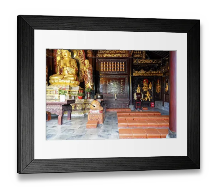 Framed Print : Impressive interior with Buddhist statues and red details Framed Print : Impressive interior with Buddhist statues and red details