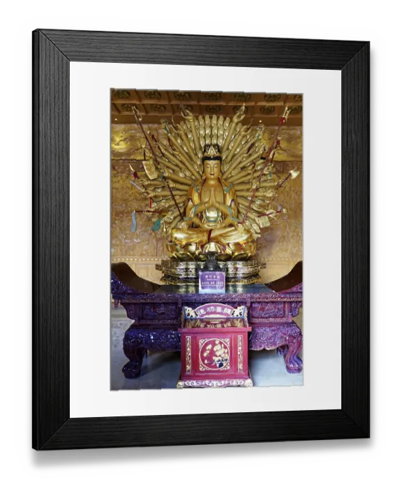 Framed Print : Complex golden Buddha statue with numerous arms in an ornate room Framed Print : Complex golden Buddha statue with numerous arms in an ornate room