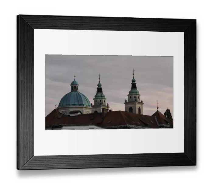 Framed Print : Three church towers and a dome rise against a cloudy evening sky Framed Print : Three church towers and a dome rise against a cloudy evening sky