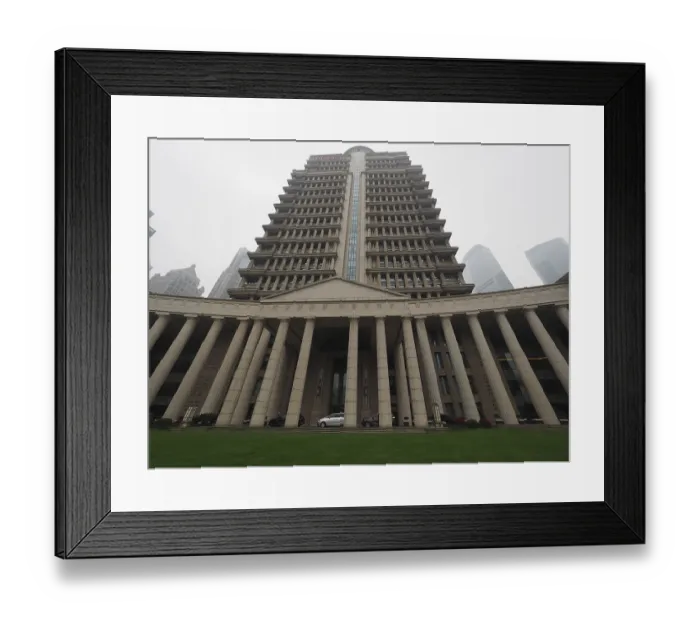 Framed Print : Large symmetrical building with pillars and lawn in an urban environment Framed Print : Large symmetrical building with pillars and lawn in an urban environment