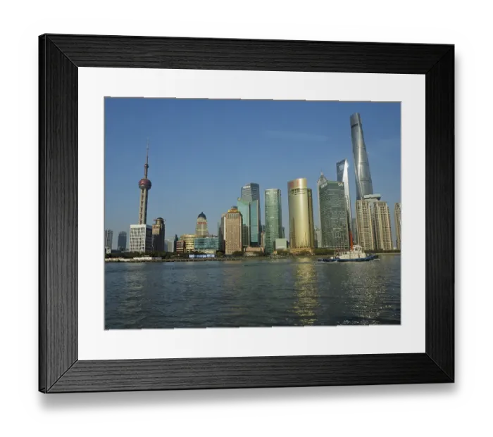 Framed Print : Modern urban skyline of Huangpu Jiang on the water under clear blue sky