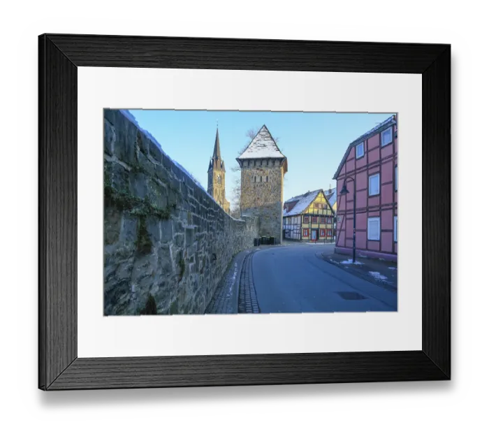 Framed Print : City wall with tower, St. Sturmius Catholic Church Framed Print : City wall with tower, St. Sturmius Catholic Church