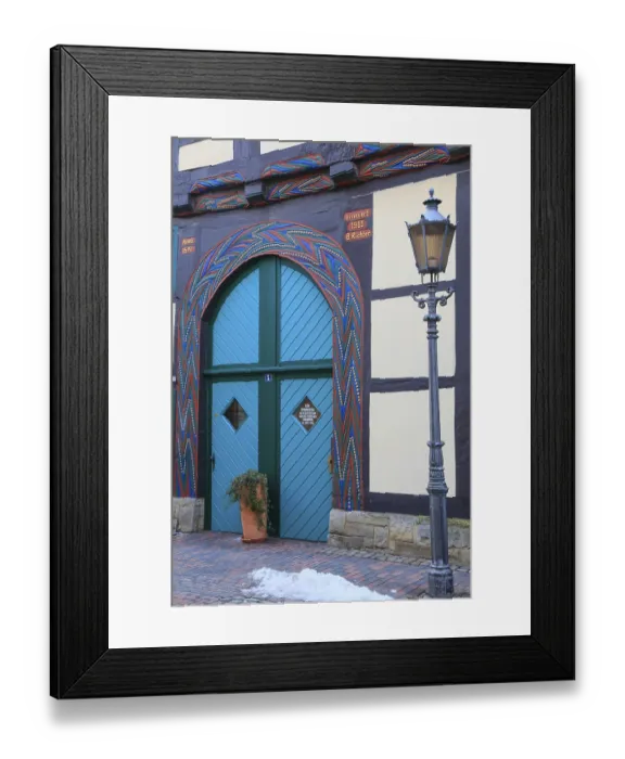 Framed Print : Colourfully painted gate entrance of a 16th century half-timbered house in BackerstraBe Framed Print : Colourfully painted gate entrance of a 16th century half-timbered house in BackerstraBe
