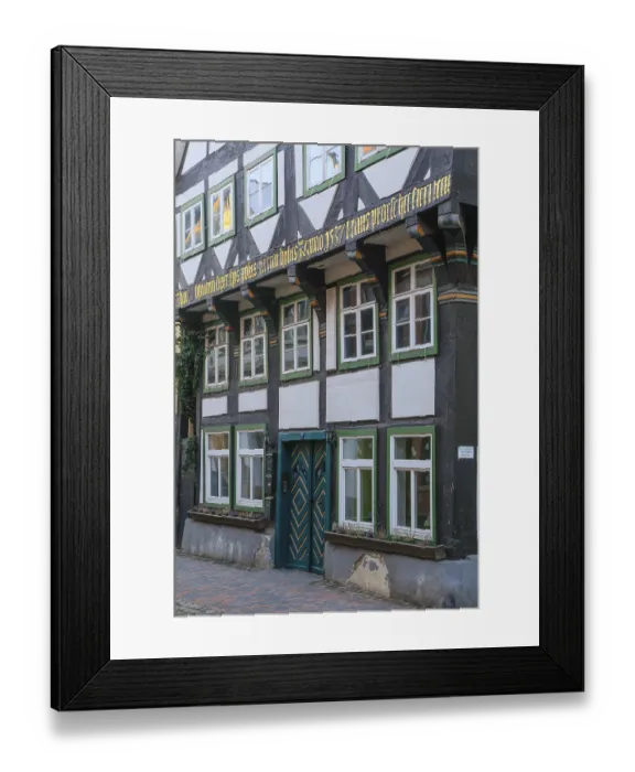 Framed Print : 16th century half-timbered house with overhang or cantilever in BackerstraBe Framed Print : 16th century half-timbered house with overhang or cantilever in BackerstraBe